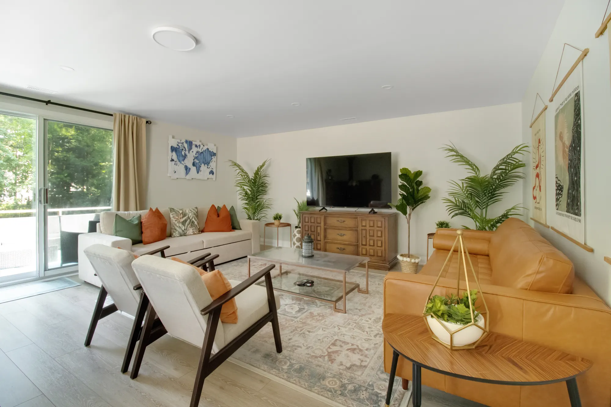 The living room, with sofa and armchairs around a low table